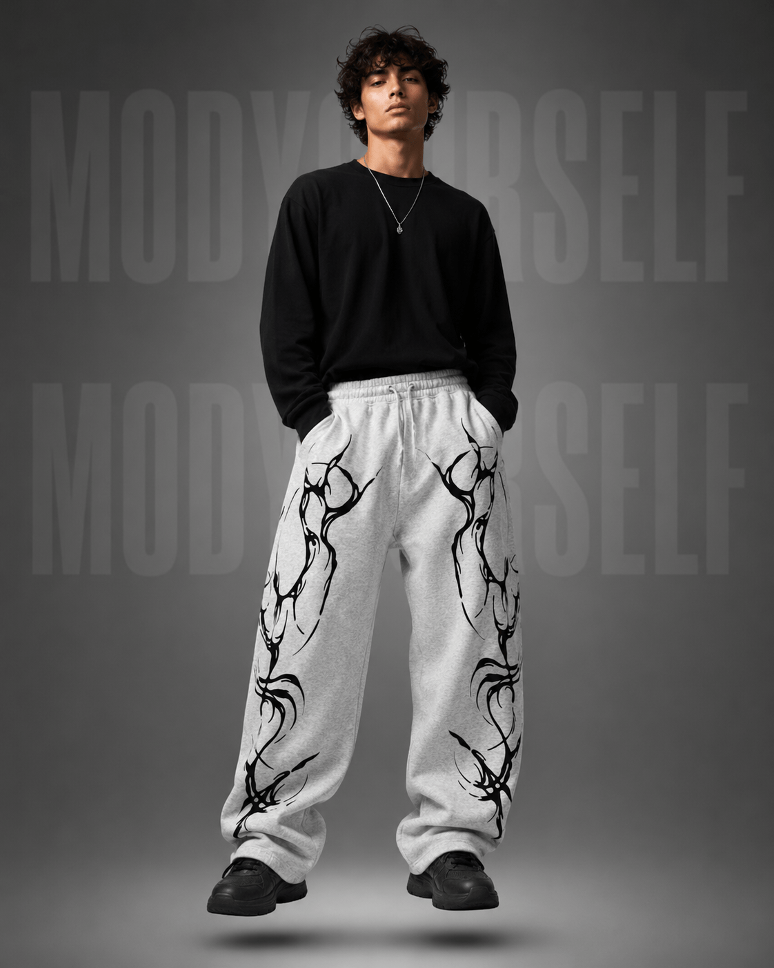 Eclipse Tribal Tracks Model wearing ModYourself Straight Fit Eclipse Tribal Tracks featuring futuristic tribal graphics and luxury straight-fit silhouette.