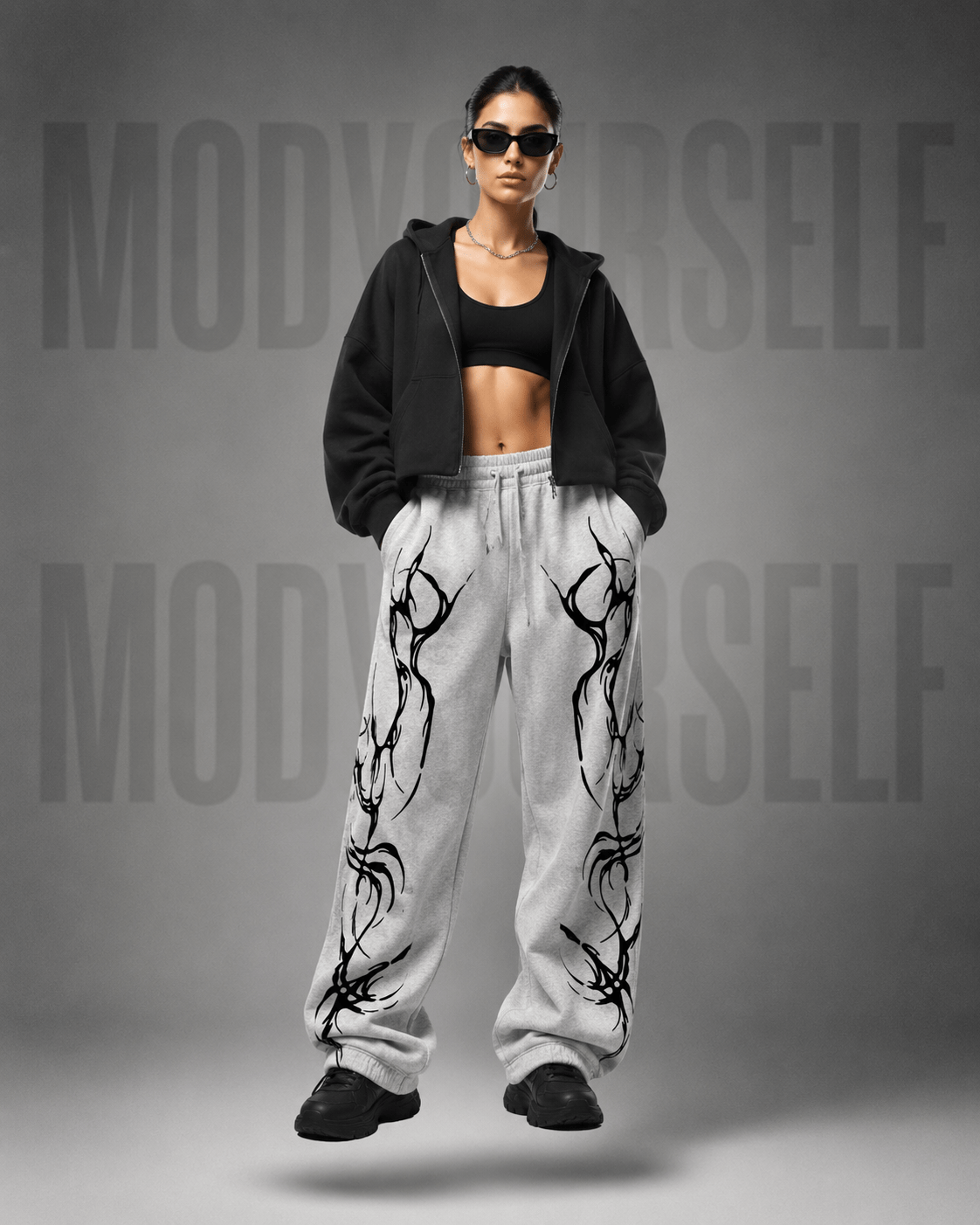 Eclipse Tribal Trackss Model wearing ModYourself Straight Fit Eclipse Tribal Tracks featuring futuristic tribal graphics and luxury straight-fit silhouette.
