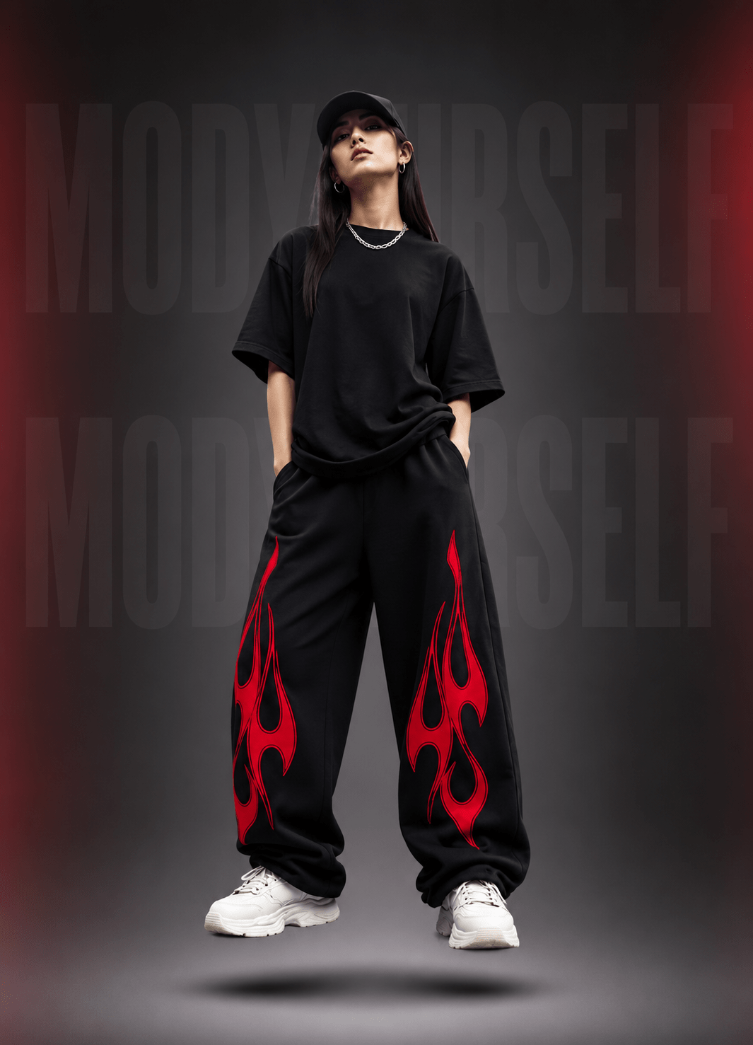 Phantom Flame Trackpants Model wearing ModYourself Phantom Flame Trackpants with luxury motorsport-inspired flame detailing and tapered streetwear fit.