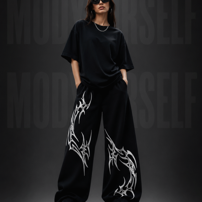 Model wearing ModYourself Straight Fit Shadow Spine Joggers with futuristic spine graphics and luxury stacked streetwear fit.