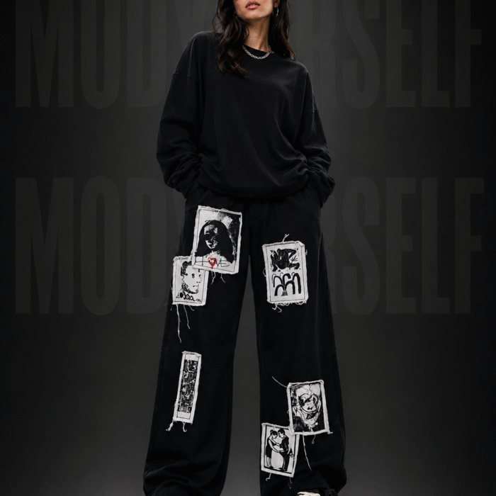 Model wearing ModYourself Straight Fit Anarchy Patch Tracks featuring patchwork graphics and luxury streetwear silhouette.