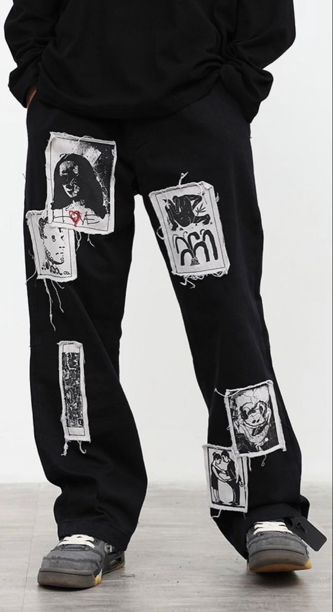 download (11) Model wearing ModYourself Straight Fit Anarchy Patch Tracks featuring patchwork graphics and luxury streetwear silhouette.